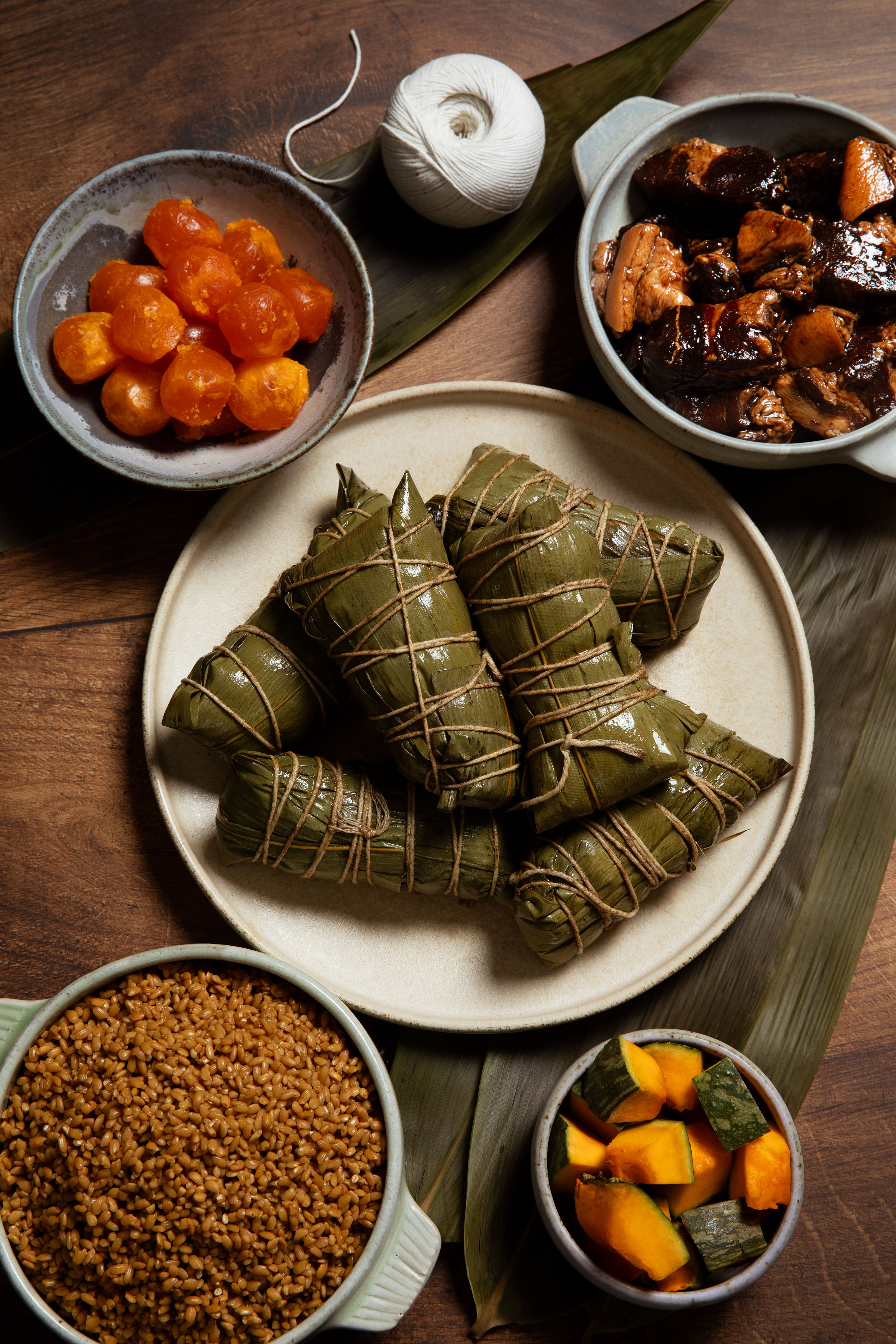 Zongzi and accompaniments set out on the table